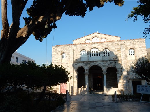 Panagia Ekatontapiliani or the Church of the 100 Doors is the oldest in Greece. The church has no bell tower and instead the bells are hung outside from a tree. Legend has it the commissioned architect was thrown off the roof of the church.  Paros's patron saint Theoktisti's hand and footprint on also on display.  