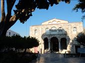 Panagia Ekatontapiliani or the Church of the 100 Doors is the oldest in Greece. The church has no bell tower and instead the bells are hung outside from a tree. Legend has it the commissioned architect was thrown off the roof of the church.  Paros's patron saint Theoktisti's hand and footprint on also on display.  : by danidawnandstevo, Views[433]