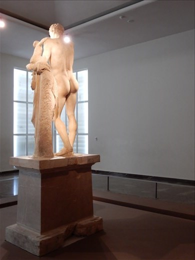 Hermes of Praxiteles. Overhead a tour guide say this guy gets best buns award. 