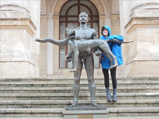 Quite possibly the ugliest statue in Bucharest. The statue is not well received by locals due to the awkwardness of an emperor not wearing any underwear while a stray dog wearing a scarf levitates in his arms. 