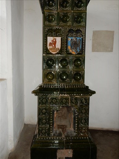 A terra cotta heater used in the rooms of royals back in the day.