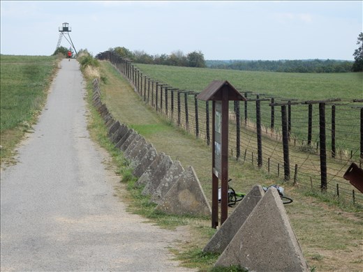 The biking tour follows the Iron Curtain. Up until the mid 1960's, 10,000 volts of electricity flowed through the fences. 390 people died between 1948 and 1989 on the Czechoslovakia side of the border trying to cross and 654 border guards died although only 10 died from conflicts from border violators. The others died from suicide, electrocution, drowning or accidents with guns. The Iron Curtain stretched 7,250 km from the Baltic Sea to the Adriatic Sea and this section of the Iron Curtain in Clzov is the only preserved section in the Czech Republic. 