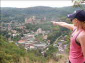 The town of Hardegg Austria and Danielle pointing at either where we are going for lunch or the very steep road we will have to climb out of town. : by danidawnandstevo, Views[335]