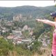 The town of Hardegg Austria and Danielle pointing at either where we are going for lunch or the very steep road we will have to climb out of town.  Views[371]