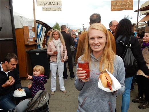 Bratwurst and a cup of wine to wash it down. 