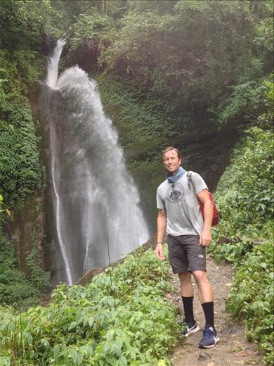One of the many waterfalls along the trail. When we saw our guide taking a photo of it we knew something was special. He said in his 18 years of doing this trail this is the first time he has seen this much water causing it to deflect off a rock and shower us. 