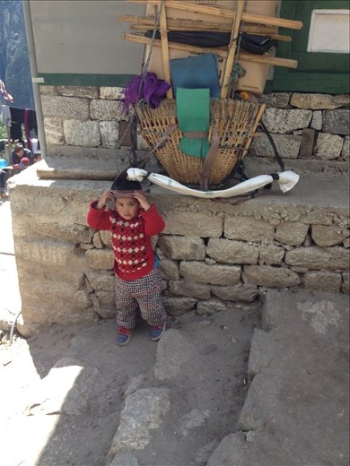 Future sherpa. You can bet his name is Tenzing since most of the men around here have that name. 