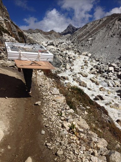 Always amazed at what was carried up on peoples backs. This was windows and plywood for a new lodge. 