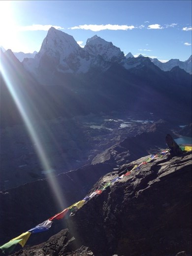 Top of Gokyo Ri just as the sun comes over Everest. 