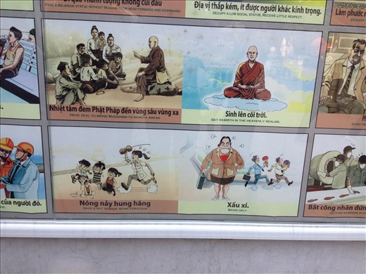 A Buddhist cause and effect list displayed outside the pagoda. 