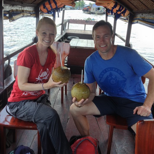 Fresh coconut water on the Mekong River. 