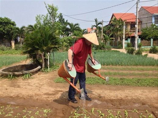 Some watering the old fashioned way. 