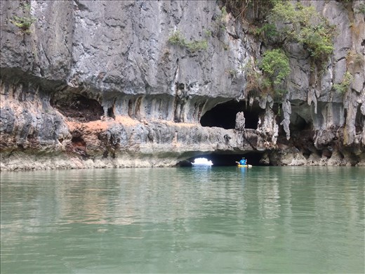 Entering one of the many sea caves in Phang Nga Bay. 