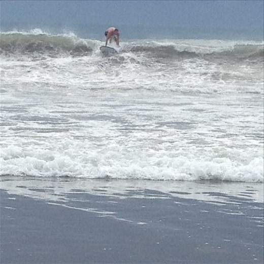 Blake catching a wave