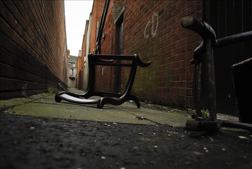 Belfast, Short Strend.
Short Strend is a Catholic enclave in East Belfast, surrounded by the mainly Protestant and unionist neighborhood, from which it is separated by the so called peacewall, a metal barrier 6-7 meters high. Even though many years have passed since the 'Troubles' there objects are thrown from each side to others and sometimes there are aggressions. 
This was a calm alley. Nobody was around but I got the feeling that something that happened and might happen again.