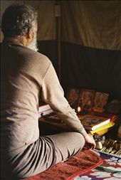 in the scorching heat of the 40˚ sun, this Vedic astrologer returns to his dwelling to recite mantras and read the vedic scriptures for the 6 hours following his daily cleanse. He, and many other like him in this 32kmsq tent city, will do this every day for the entire 55 days of the Maha Kumbh: by danielhaley, Views[1038]