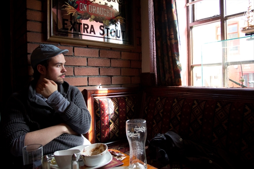 After a long day of driving, Matthew, my travel companion, indulges in some of the local favorites at the Dingle Pub: Guinness pie and a pint of beer. He gazes out the window on to the busy streets of Dingle, where tourism is a main source of the town’s income during the summer season. 

