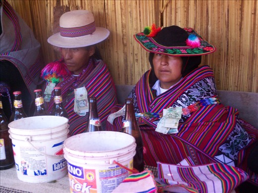 Weddings in this island last 8 days and the couple must remain sitting like that. They don't use invitations, all the people in the island 
(about 2.200) must go to the wedding party. Every guest has to attach money to their clothes and they will 
be provided with food and drinks. 35 sheeps had been killed for this unique wedding.