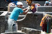 At work is common to see men washing several pieces of clothing at a time against a hard surface.: by danielsordo, Views[314]