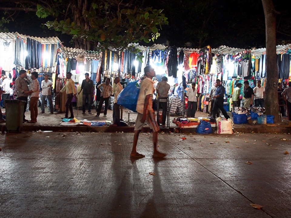 The impersonal supermarket is not the usual location to get your groceries in Mumbai. Here the market place is still very much alive, a crowded and busy meeting place, where neighbors shake hands and personal exchanges ties bonds between strangers.