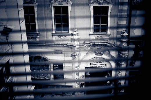 Looking down through the blinds of the White Unicorn gallery.