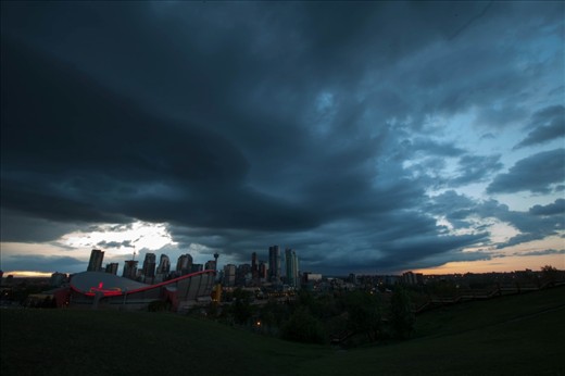 Thunderstorm rolling over Calgary city before the June 23rd down poor that lead to the displacement of 100,000 people in the region. A city of more than a million people and home to the famous Calgary Stampede. Its Saddle Dome hockey stadium filled up to the 17th row with the muddy flood waters.
