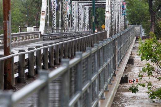 The Bow river getting close to reaching the bottom of this bridge, this one lived to see another day. Many others came to a less fortunate fate. 