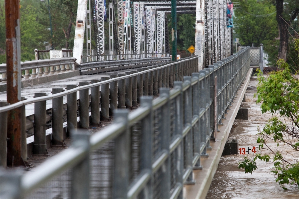 The Bow river getting close to reaching the bottom of this bridge, this one lived to see another day. Many others came to a less fortunate fate. 