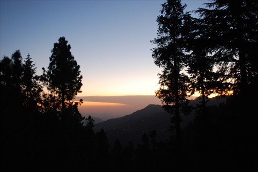 At an altitude of roughly 7000 feet, the sun sets on the southern slopes of the Western Himalayan foothills. Murree is a popular tourist destination for Pakistanis, most notably because of its snowy winters.