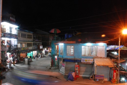 Store owners and vendors close shop as night falls on Murree and reveals small inns sitting atop restaurants and a less congested street. Though there is a large influx of tourism Murree has yet to see major development.