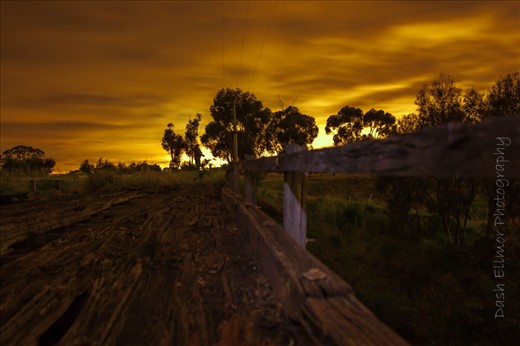 11.15pm, pitch black except for the city lights on the horizon. 30 sec exp. Can you see the photographer in this shot? He there.