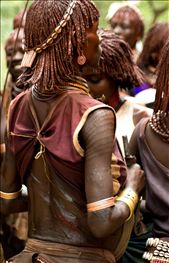 As a women are beaten by men the dance ceremony continues. : by dav1, Views[409]