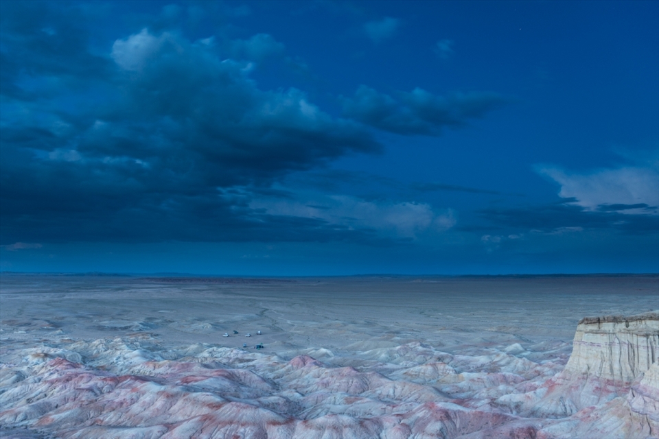 The great beyond: after sunset, the White Stupa Cliffs take on an ethereal light. The cliffs have been eroded over 10 million years, with each band of colour telling a story of pre history.