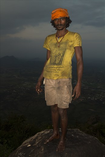 Probu, One of the chosen five to light the fire, normally he sells handicrafs