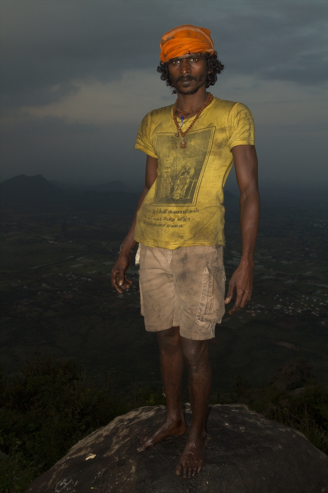 Probu, One of the chosen five to light the fire, normally he sells handicrafs