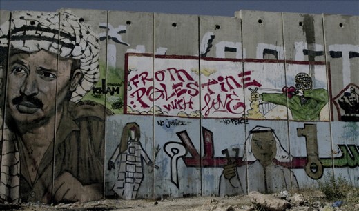 messages on the palestian side of the separation wall at Qalandia checkpoint
 
