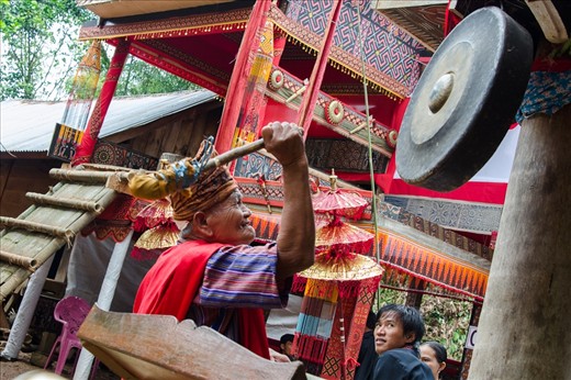 In Indonesia's Tana Toraja, it is traditionally believed that death is not a sudden, dreaded event, but a gradual process toward Puya, the land of souls or afterlife.  When a death occurs, the community comes together at the sound of a gong to do what they can to guide the deceased to their ancestors in the afterlife.
