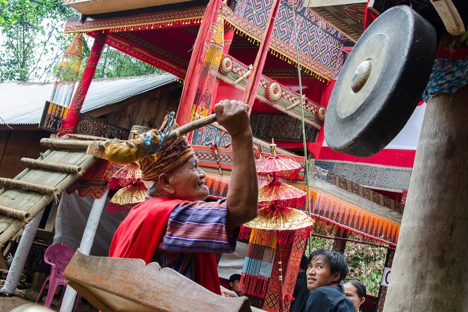 In Indonesia's Tana Toraja, it is traditionally believed that death is not a sudden, dreaded event, but a gradual process toward Puya, the land of souls or afterlife.  When a death occurs, the community comes together at the sound of a gong to do what they can to guide the deceased to their ancestors in the afterlife.
