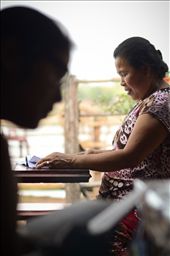 Mothers studying the school books of their daughters: by daviedm, Views[583]
