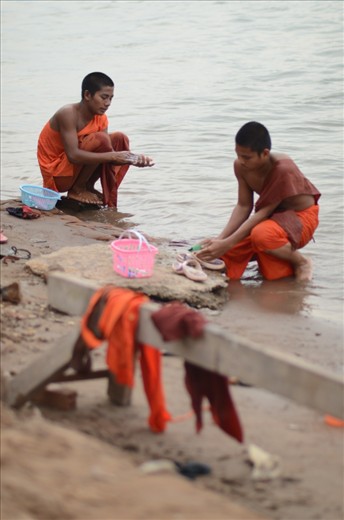Monks washing their clothes in the Mekong