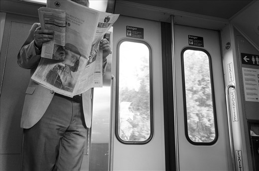 I snapped this while sitting on a train, surrounded my middleclass workers in ON