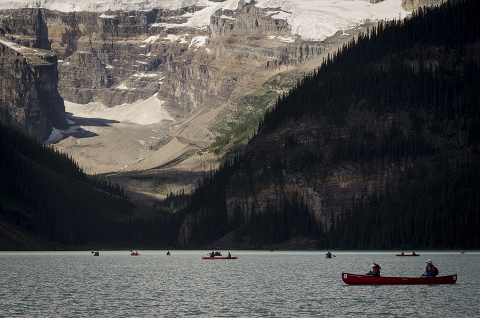 St. Louise Lake, AB filled with ice-cold water, and adventerous Kayakers. 