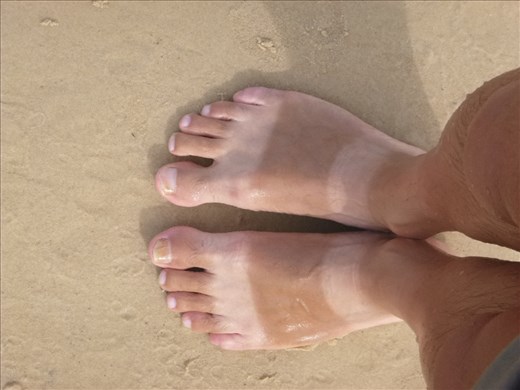 Marks dodgy sun tanned feet