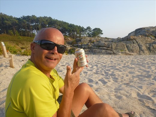 Back in Galacia after 8 hour drive, well deserved beer on beach for driver!