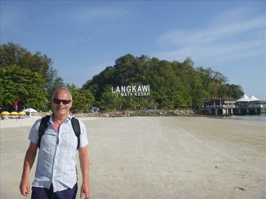 beach on langkawi and food heaven restaurant on right