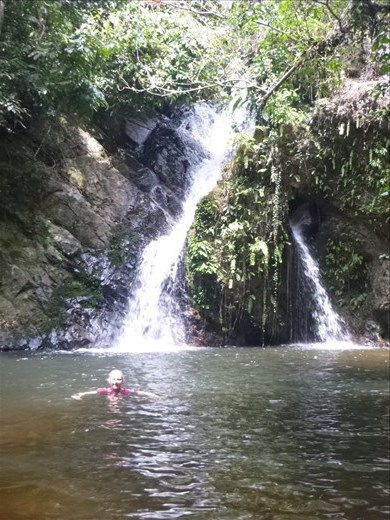 me swimming at waterfall
