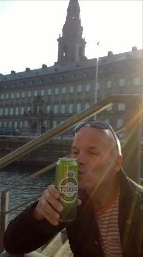 drinking beer the Danish way, sat on the steps at the side of the waterway