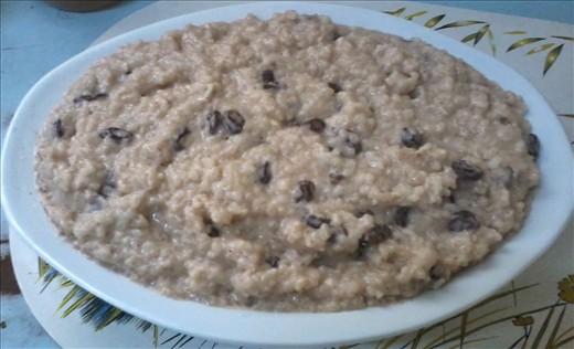 Let the rice pudding cool, then go on and serve into bowls.