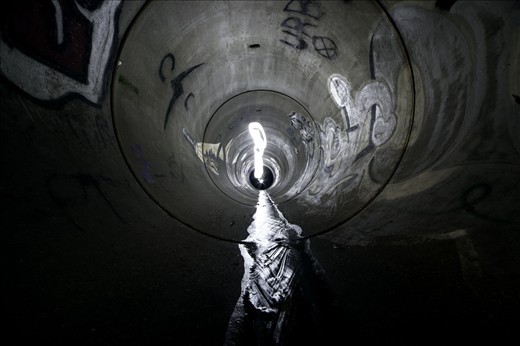 an amazing 7-8 foot round stormwater tunnel that lies underneath the earth