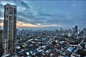 This is when I feel most uneasy with the stark contradictions that reside in me-the obscene high rise buildings and the uncountable slums staring at them, in a curious mix of disbelief and humiliation. 
I am Mumbai. 
: by debashish, Views[246]